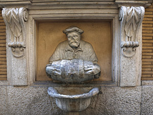 Der Facchino-Brunnen in der Via Lata soll Martin Luther als Wassertraeger darstellen. Das Gesicht wurde deswegen von zahlreichen Steinwürfen zerstört. (Foto: epd/ Romano Siciliani)