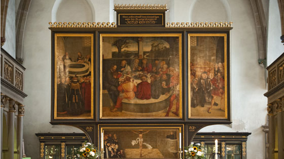 Der Reformationsaltar von Lucas Cranach dem Älteren (1472 - 1553) in der Stadtkirche St. Marien in Wittenberg 